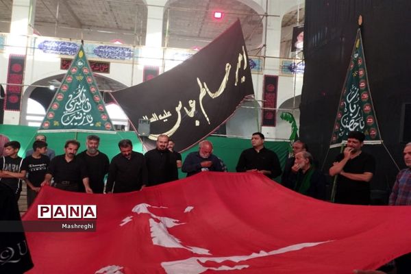 مراسم آیینی پرچم بدستان و بیرق‌داران ندای محرم نوش‌آباد