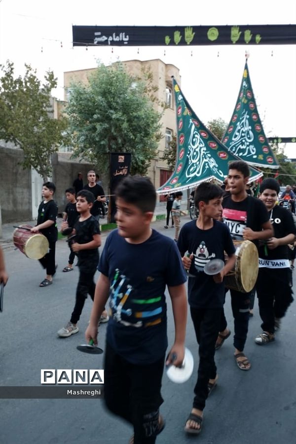 مراسم آیینی پرچم بدستان و بیرق‌داران ندای محرم نوش‌آباد