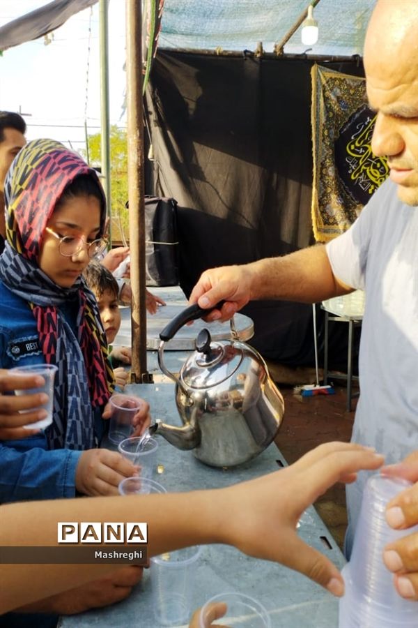 مراسم آیینی پرچم بدستان و بیرق‌داران ندای محرم نوش‌آباد