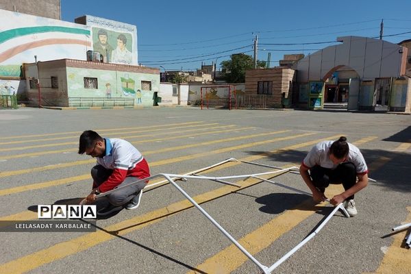 آموزش چادرزنی در پایگاه اوقات فراغت سازمان دانش‌آموزی فشافویه