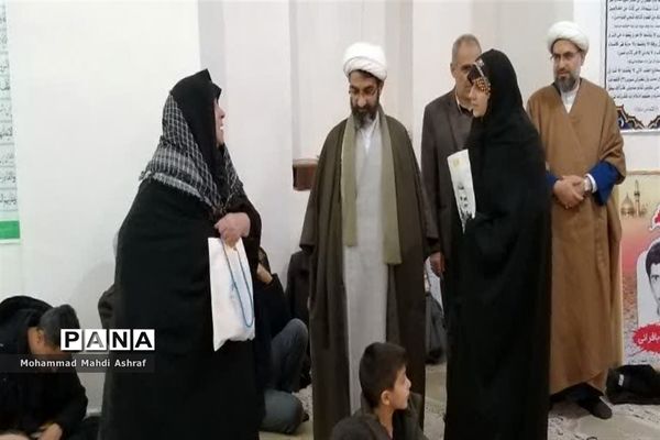 تکریم از مادران و همسران شهدای شهر بافران