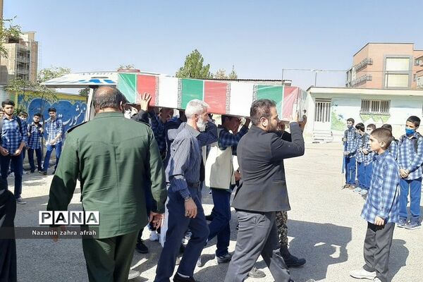 مراسم تشییع شهید گمنام در دبیرستان شهید بهشتی  رودهن