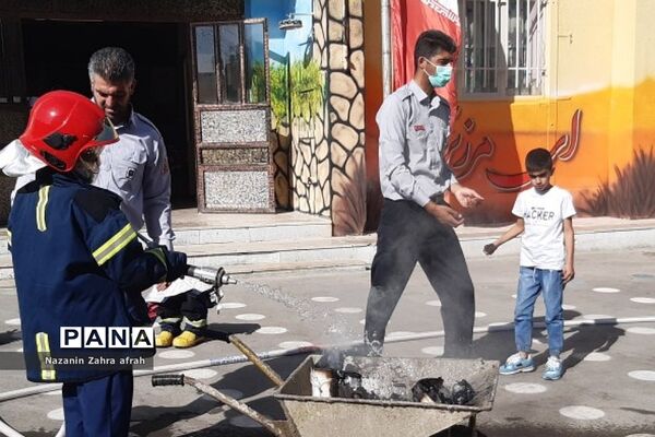 گرامیداشت روز آتش‌نشانی در دبستان ارشاد رودهن