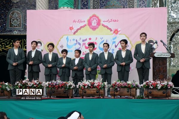 آیین تعویض پرچم گنبد حرم حضرت معصومه(س)