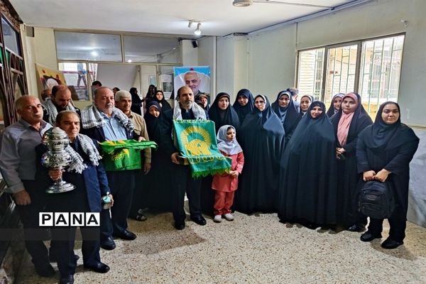 آیین پرچم‌گردانی متبرک حرم ثامن الحجج امام رضا (ع) در اداره آموزش و پرورش منطقه ۱۹