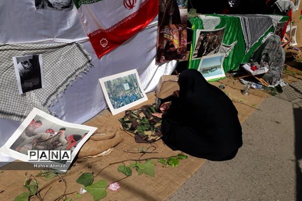 نمایشگاه هفته دفاع‌مقدس در مصلی شهرستان رباط‌کریم