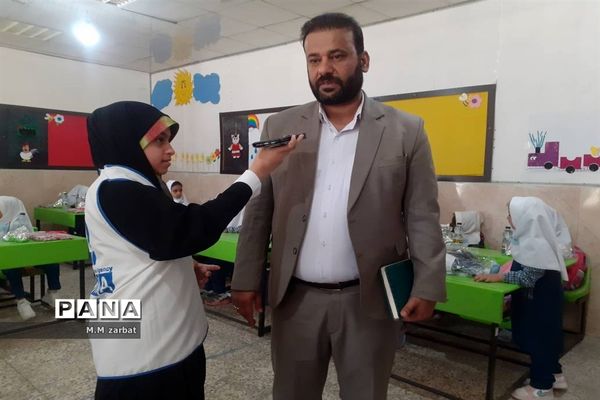 نواختن زنگ آغاز تحصیل شکوفه‌ها در دبستان پروین اعتصامی آبادان