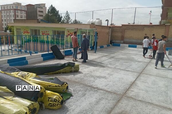 تجهیز و راه‌اندازی زمین چمن مصنوعی دبیرستان شهید بهشتی رودهن
