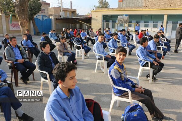 مراسم صبحگاه یار مهربان و نواخته شدن زنگ هفته کتاب در قم