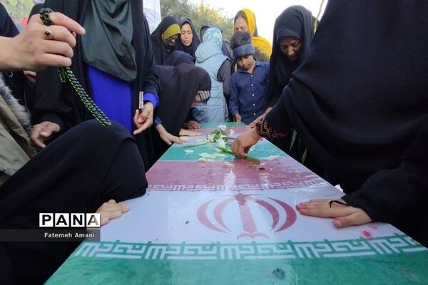 تشییع پیکر شهید گمنام در شهرستان حاجی‌آباد