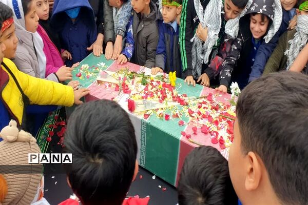 مراسم استقبال از شهید گمنام در دبستان شهید قدوسی کلوده