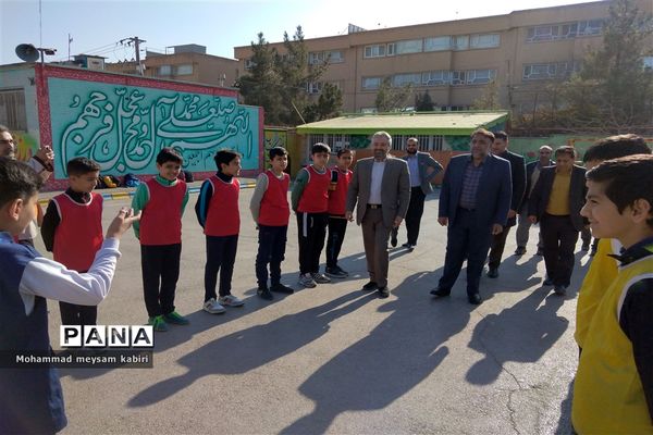 آیین کلنگ زنی زمین چمن مصنوعی دبیرستان سرآمد ناصر مشهد