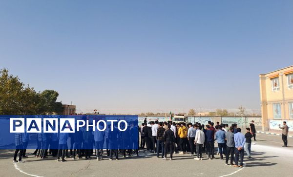 آیین نواختن زنگ پدافند غیرعامل در زاوه