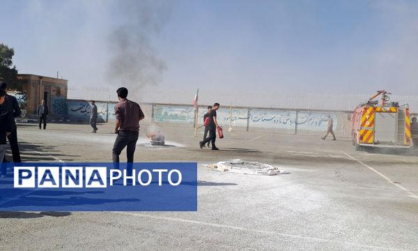 آیین نواختن زنگ پدافند غیرعامل در زاوه