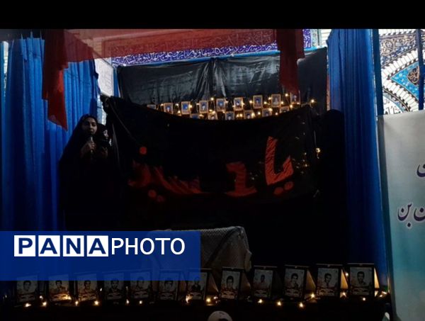 پرچم حرم حضرت عباس(ع) در مراسم اعتکاف شهرستان بن