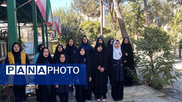 مراسم غبارروبی و عطرافشانی مزار شهدای 400 دستگاه ناحیه 3 کرج در هفته دفاع مقدس