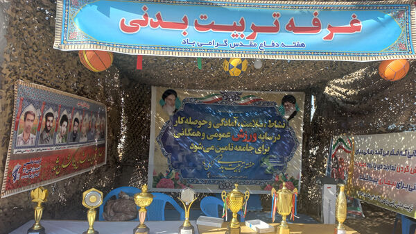 نمایشگاه هفته دفاع مقدس در مجتمع فرهنگی و ورزشی فجر نیشابور