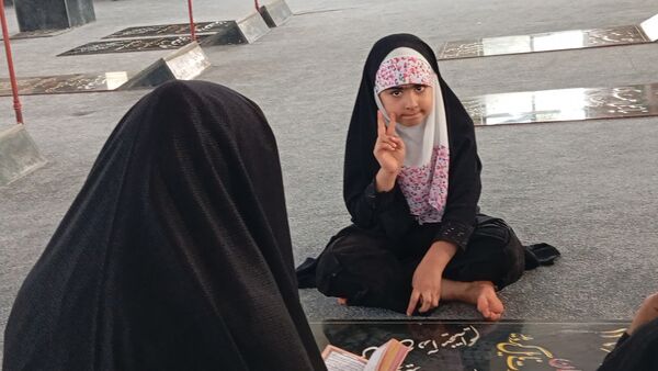 محفل انس با قرآن و یادواره «شهید احمد محمد مشلب» در شهر بن