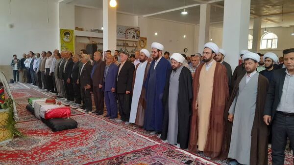 مراسم گرامیداشت شهدای بمباران هوایی شهرستان ایوانغرب