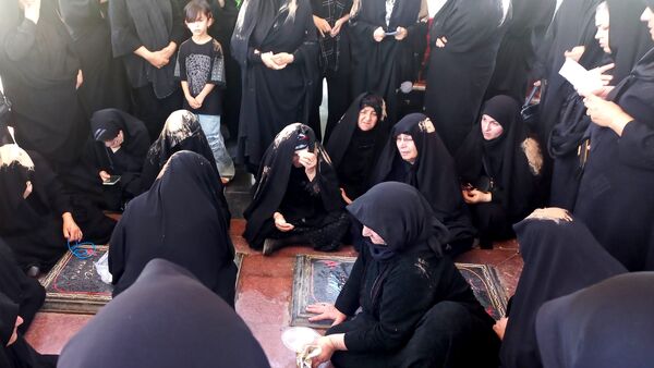 آیین سنتی «گل مالی» در روز عاشورا