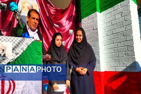 نواختن زنگ مدرسه عشق به‌مناسبت گرامیداشت هفته بسیج در شهرستان باشت