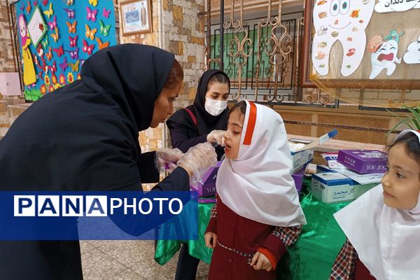 اجرای طرح وارنیش فلوراید برای دانش‌آموزان آموزشگاه باهنر۱ ملارد