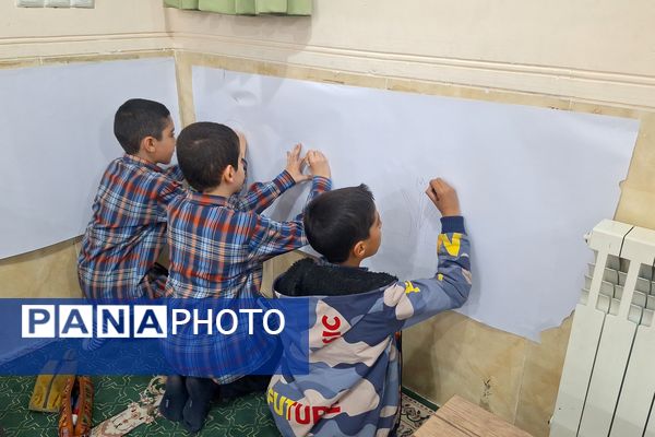 برپایی نقاشی همگانی در هفته ماها در آموزشگاه معارف۶ ناحیه ۳شیراز 