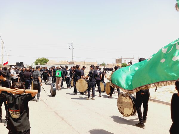 برگزاری تاسوعا حسینی در روستای بزنجرد