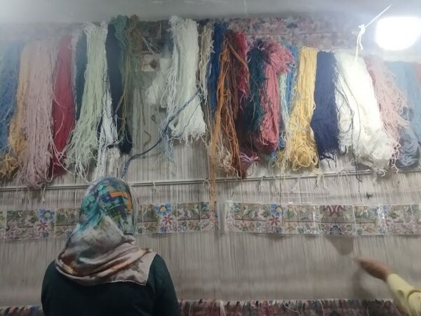 هنر قالی بافی ،پیشه‌ سنتی‌ بانوان‌ مهدی آباد خلیل آباد 