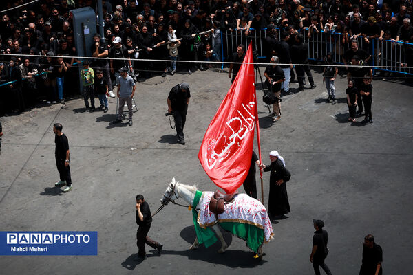 خیمه‌سوزان ظهر عاشورا در چهارراه گلوبندک تهران