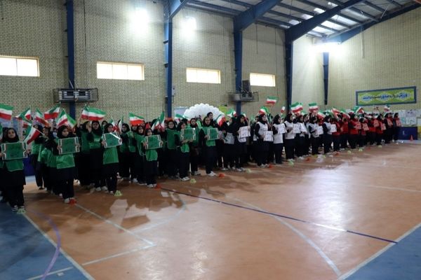 روشن شدن مشعل جام اقتدار ایران در آیین یادبود ۳۴ دانش‌آموز شهید بوشهر