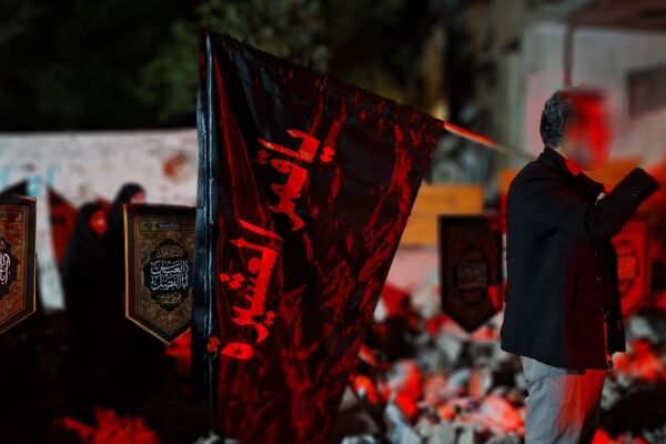 خیابان ایثار در سوگ سردار داود عسگری و خانواده‌ شهیدشان