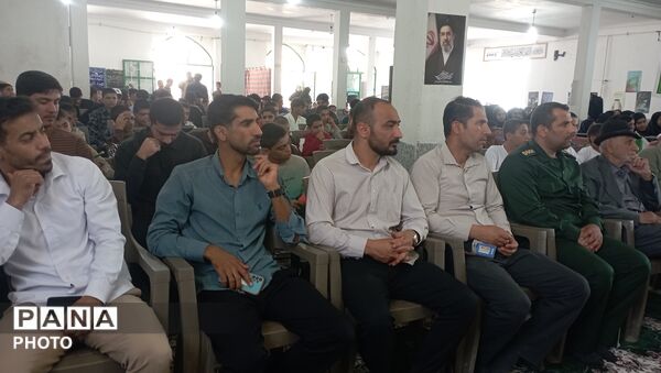 گرامیداشت هفته دفاع مقدس با حضور دانش‌آموزان روستای تمنک 