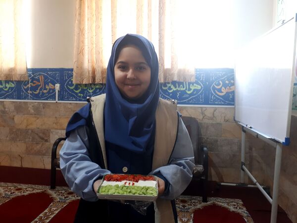 صبحانه سالم با طعم انقلاب در دبستان شاهد کوثر ناحیه 5 مشهد