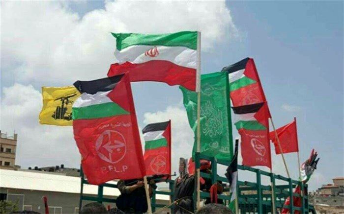 پاسخ سوری ها به تجاوز آمریکا؛ پرچم ایران و کشورهای محور مقاومت در دمشق برافراشته شد