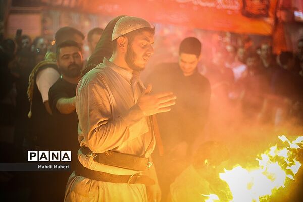 آیین مشعل‌گردانی در دولت‌آباد تهران