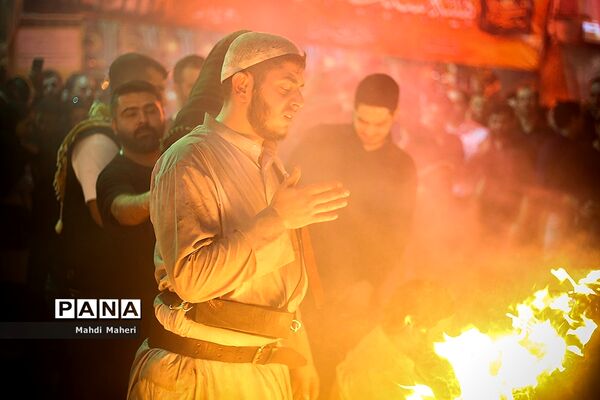 آیین مشعل‌گردانی در دولت‌آباد تهران