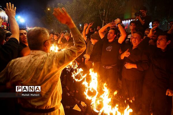آیین مشعل‌گردانی در دولت‌آباد تهران