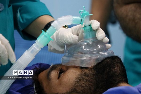 عمل جراحی ستون فقرات رضا رستمی کشتی گیر تیم ملی  در کیش