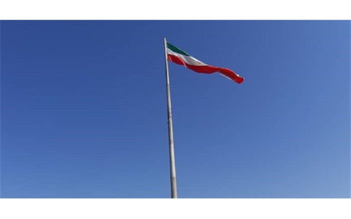 پرچم اهدایی سازمان پژوهش و برنامه‌ریزی آموزشی در محل یادمان شهدای ذوالفقاریه