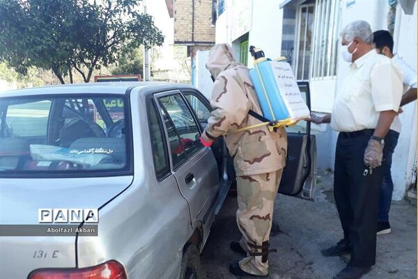 ضدعفونی کردن معابر و اماکن شهری در ساری