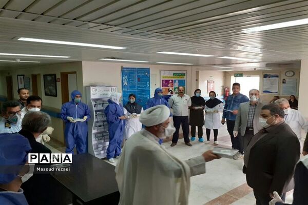 توزیع 400 پرس غذای متبرک آستان قدس رضوی بین کادر درمان و بیماران بیمارستان های میانه