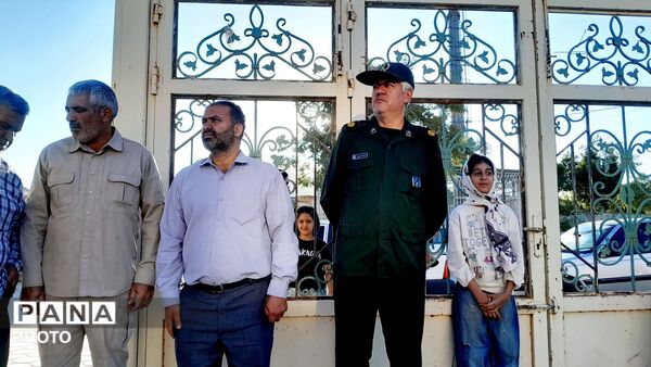 مراسم اهتزاز پرچم سرخ خونخواهی رهبر شهید بر گنبد مسجد الزهرا (س) شهربن