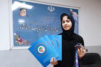 تجلیل از دانش‌آموز قهرمان برتر کشور در ناحیه یک کرمانشاه