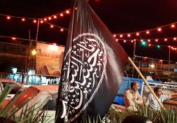 توزیع شربت نذری توسط سازمان دانش آموزی فارس
