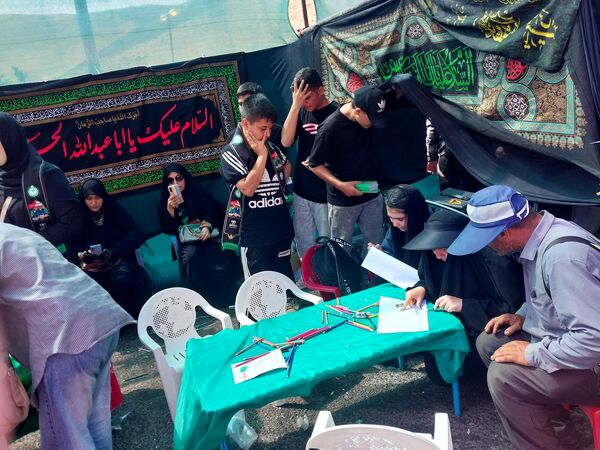 خدمت‌رسانی پیشتازان و خبرنگاران دانش‌آموزی در موکب عشاق‌الحسین گاوازنگ