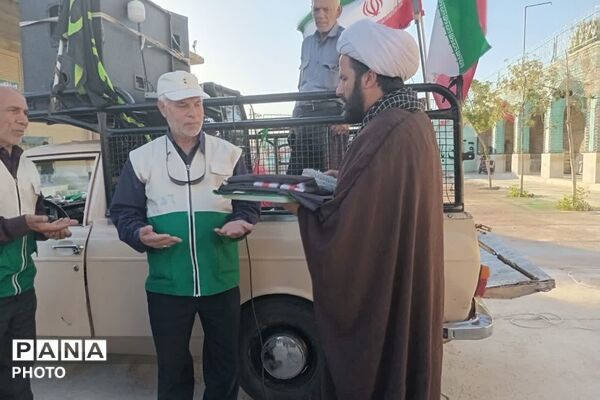 برافراشته شدن پرچم عزای حسینی در امامزاده قاسم زرقان