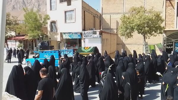 خیابان‌های بن، رنگ ماتم گرفت: تشییع نمادین پیکر امام هشتم