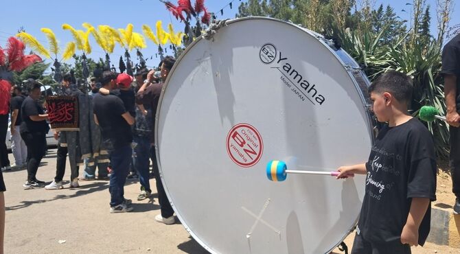 عزاداری ظهر عاشورا در روستای ولیان ساوجبلاغ