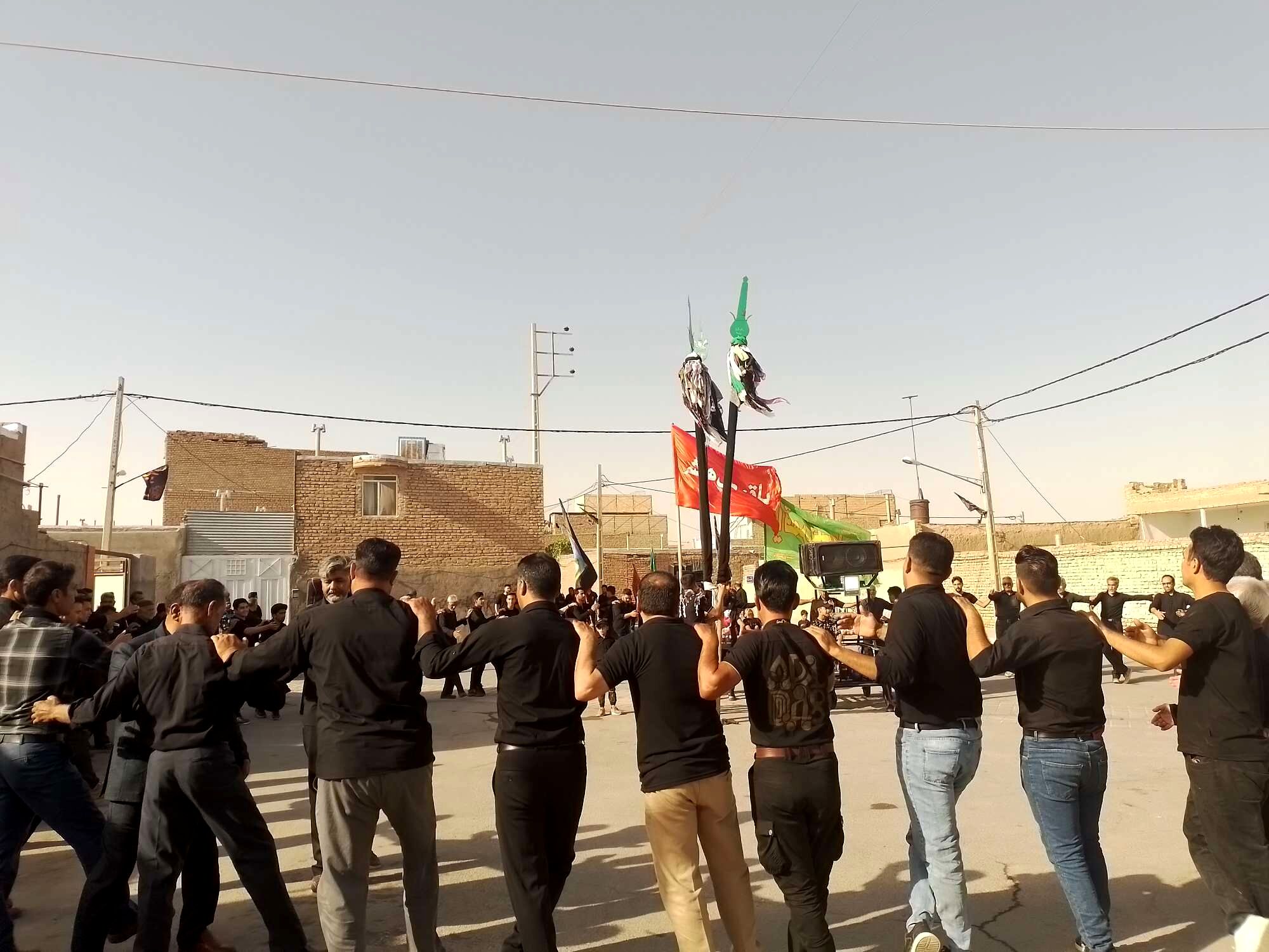 برگزاری مراسم عزاداری سنتی ( حسن - حسین ) در روستای نقاب شهرستان خلیل آباد